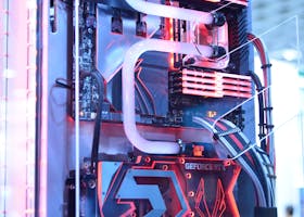 pexels-photo-2399840-2399840 Close-up view of a custom gaming PC with water cooling and LED lights, highlighting advanced technology.